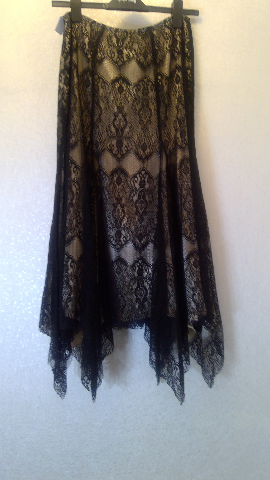 Black lace suit with a long train