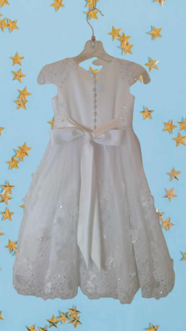 White dress with floral lace details for small girl