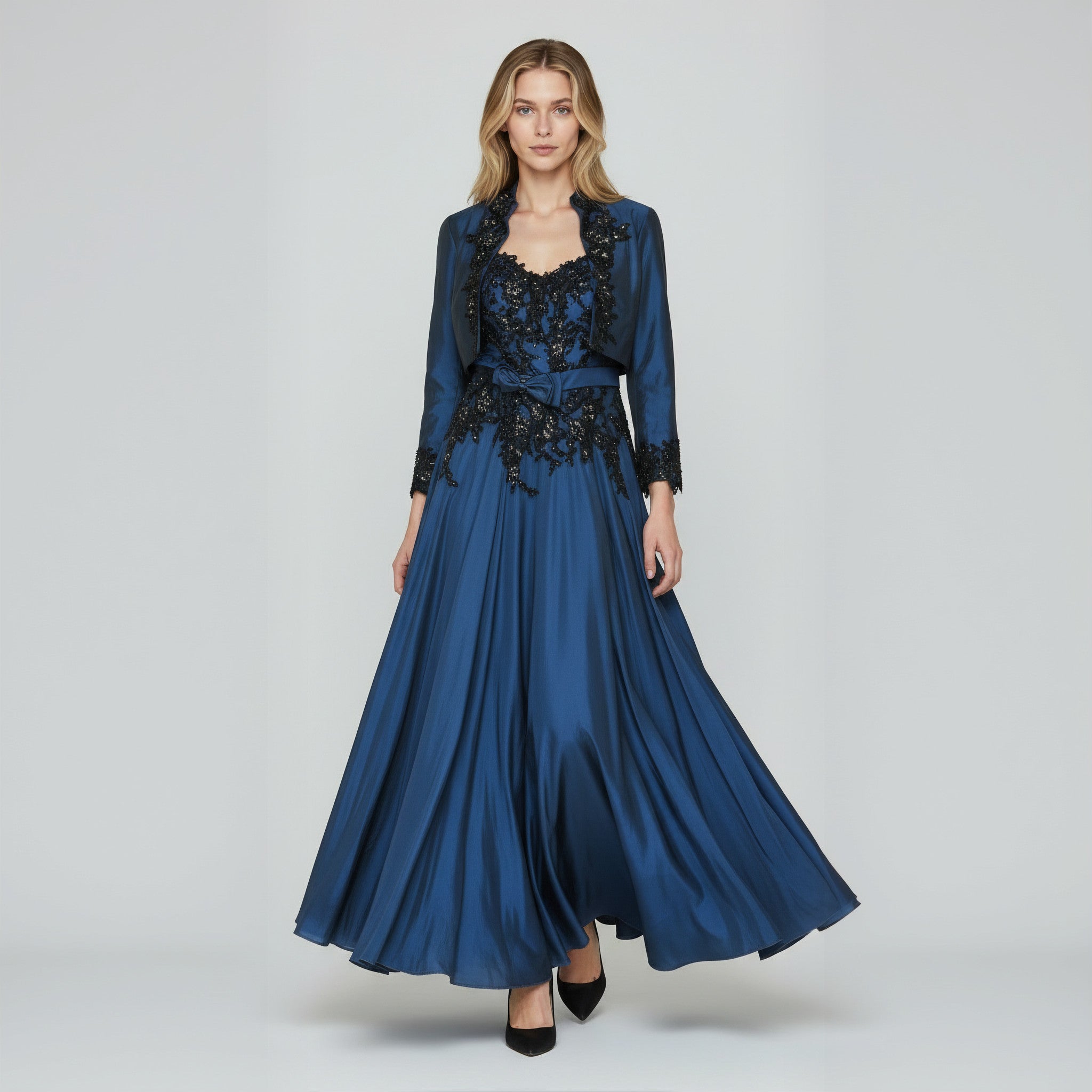 Blue evening gown with black embellishments