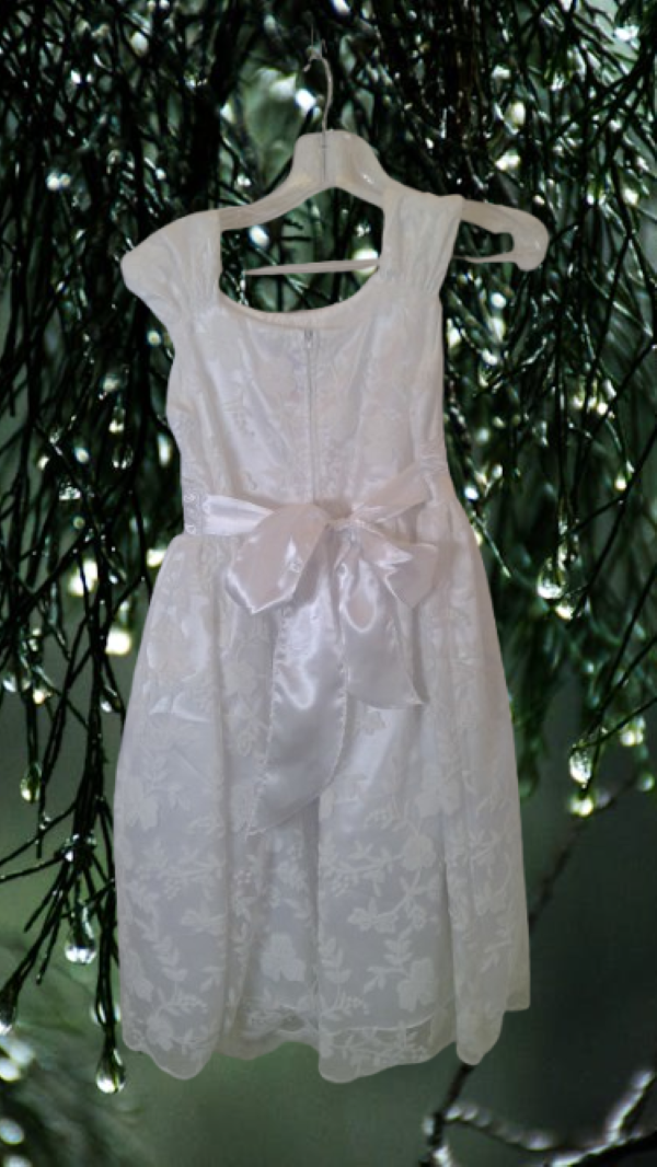 A smart, artistically patterned dress for a girl for any important event