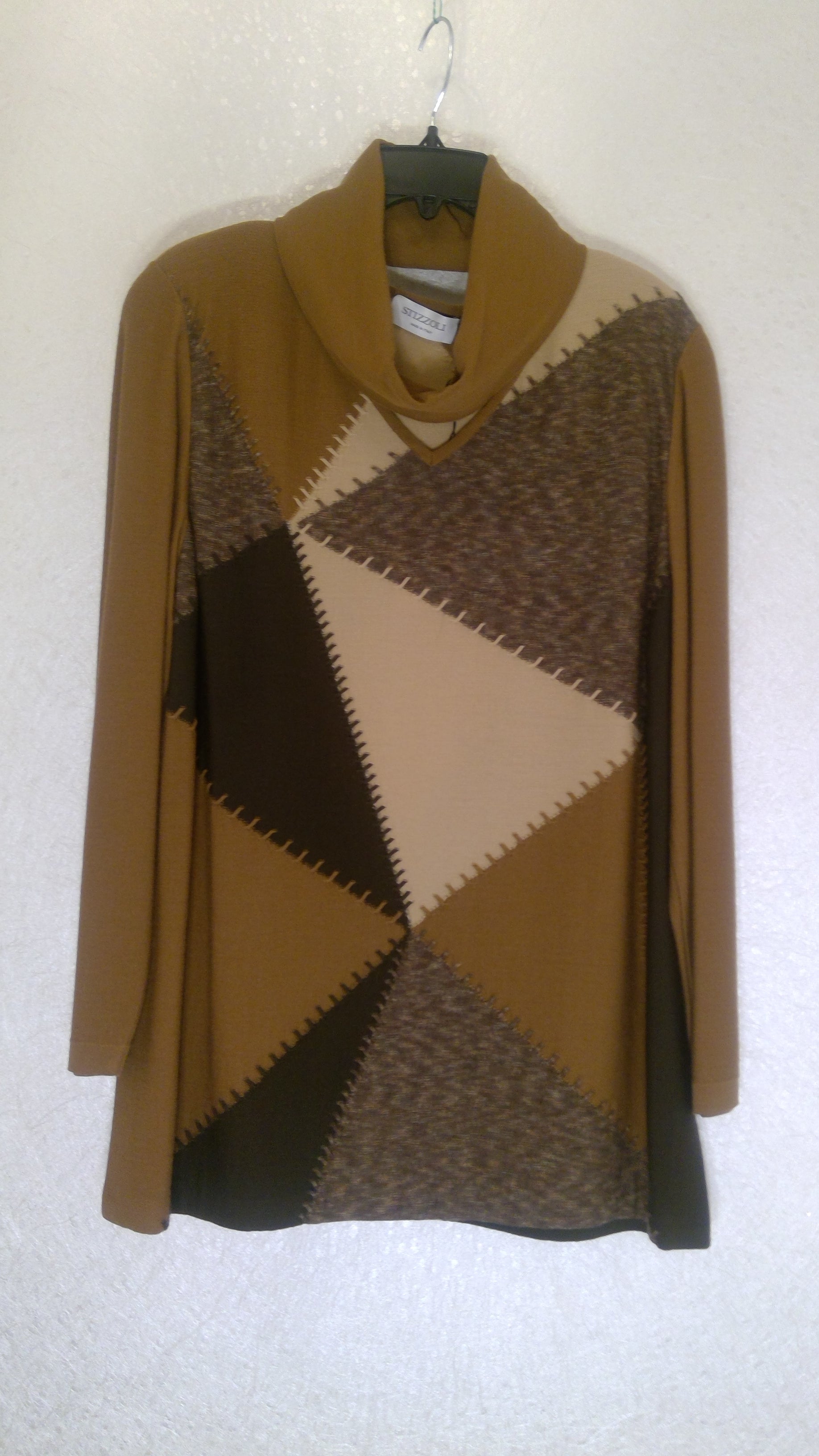 Sweater with fabric brown, beige, and black diamond pattern