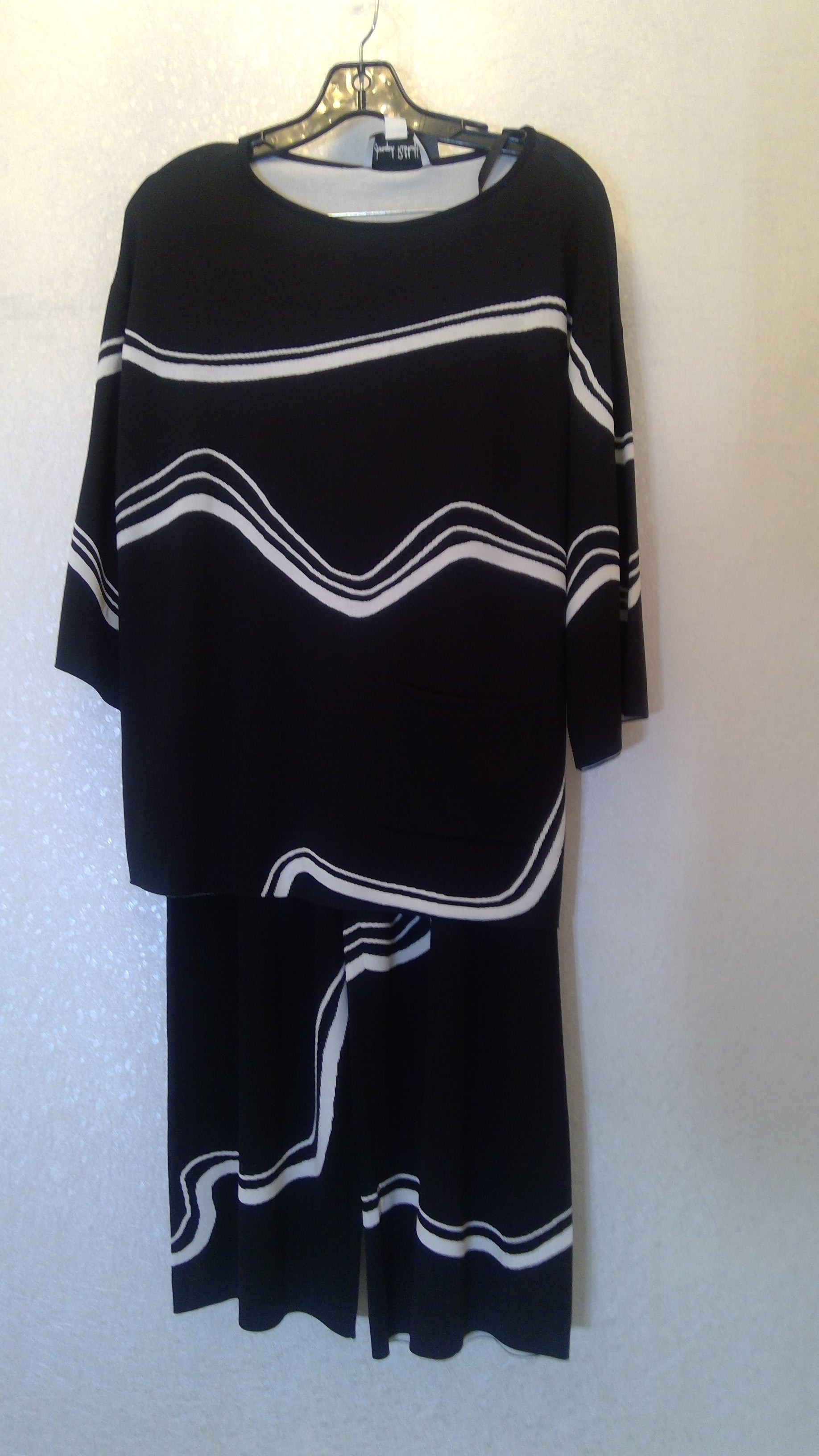 Women's black suit with white patterns