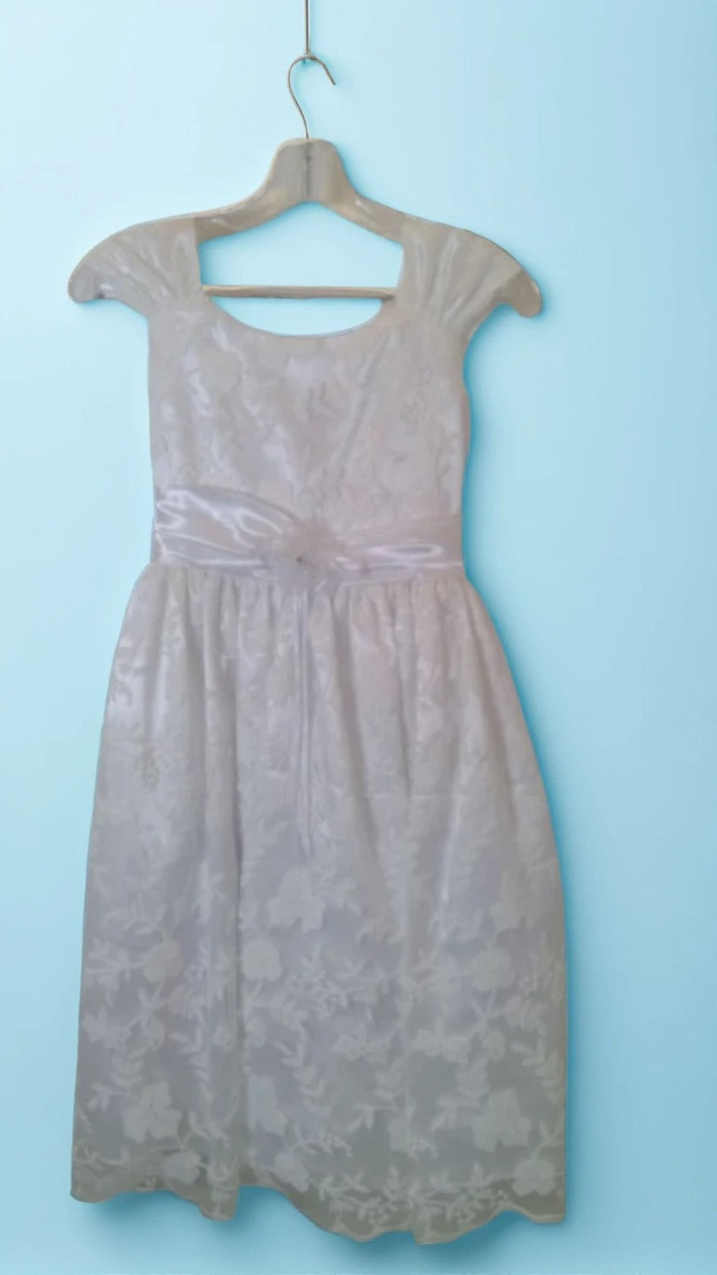 A smart, artistically patterned dress for a girl for any important event