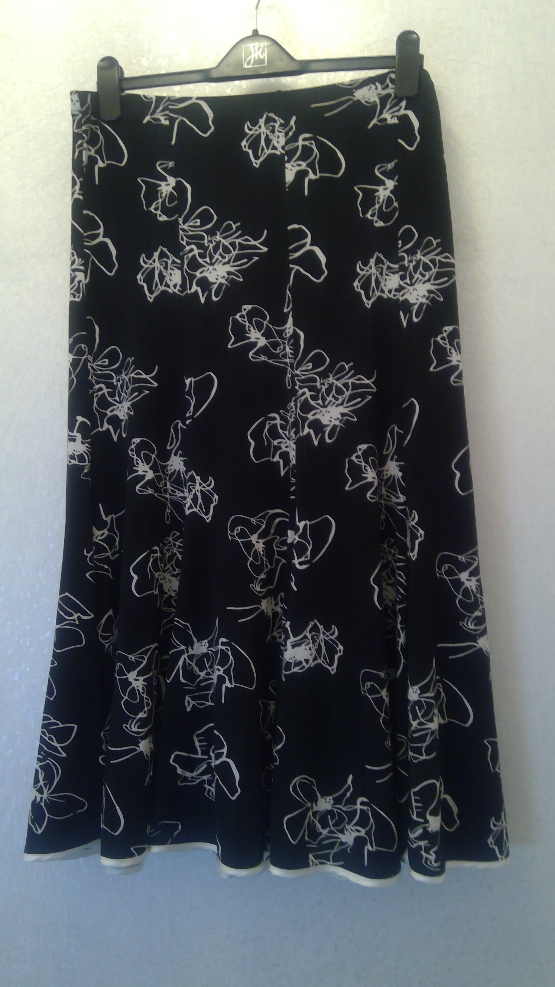 Black skirt with white floral pattern for women