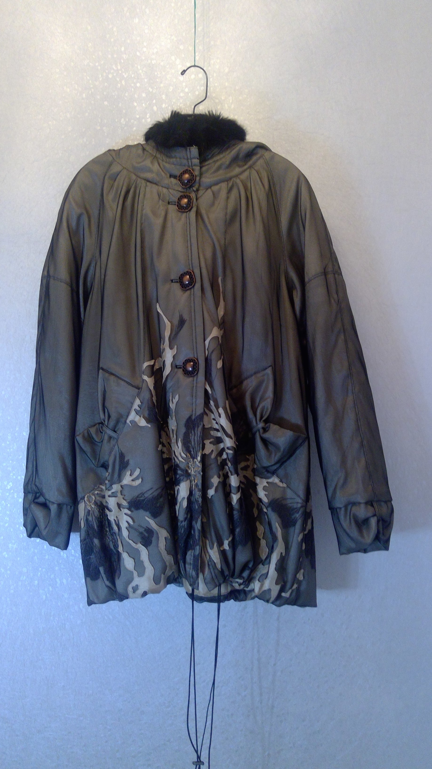 Black jacket with partially camouflage style