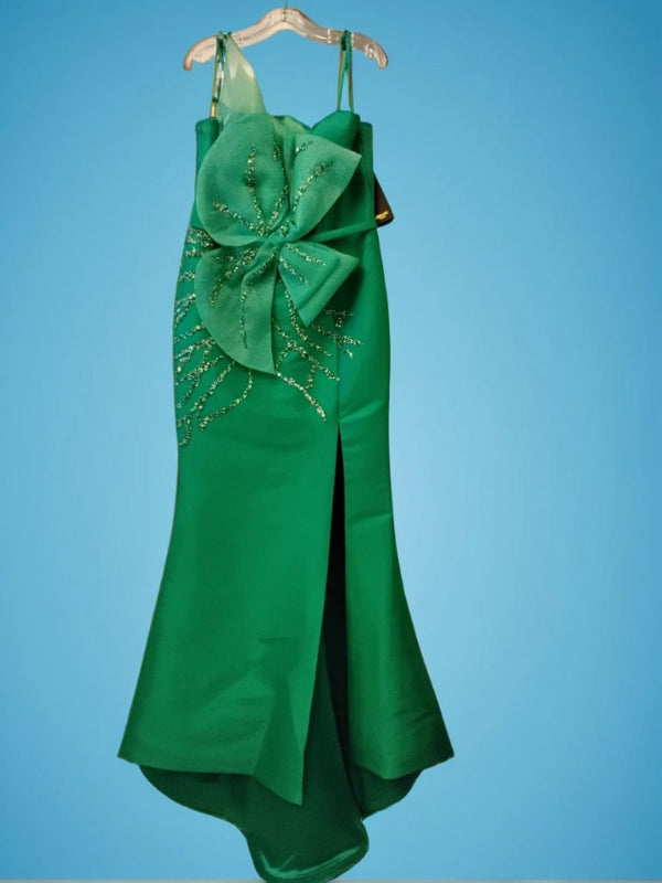 Green evening gown with a large bow