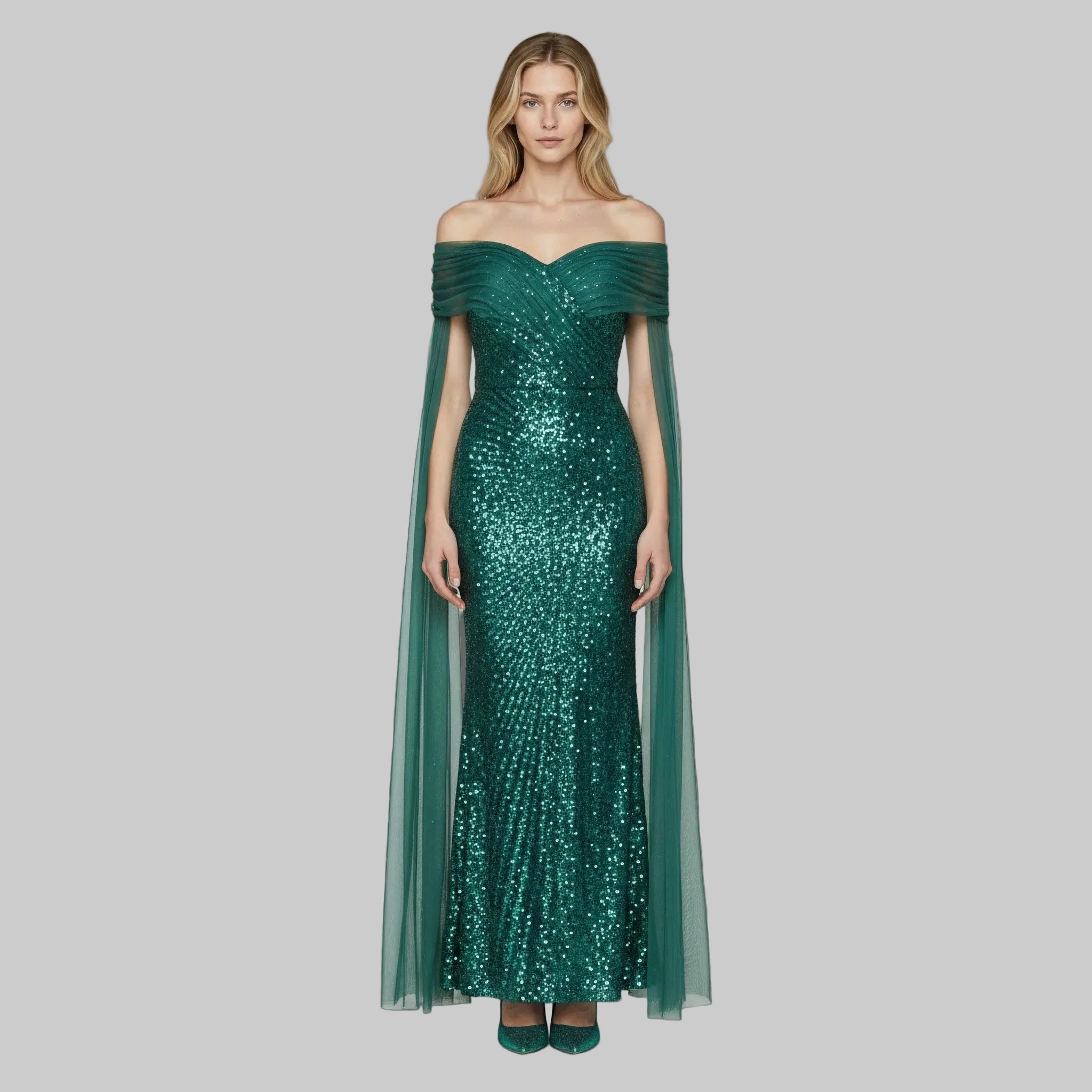 Green sequin gown with a cape