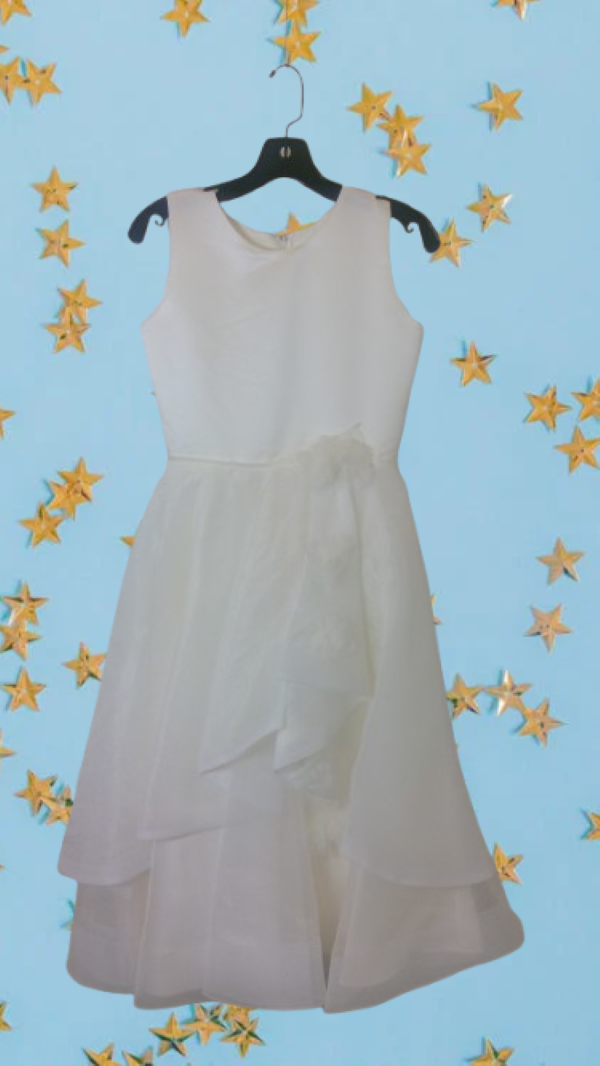 A smart, artistically patterned white dress for girl for any event