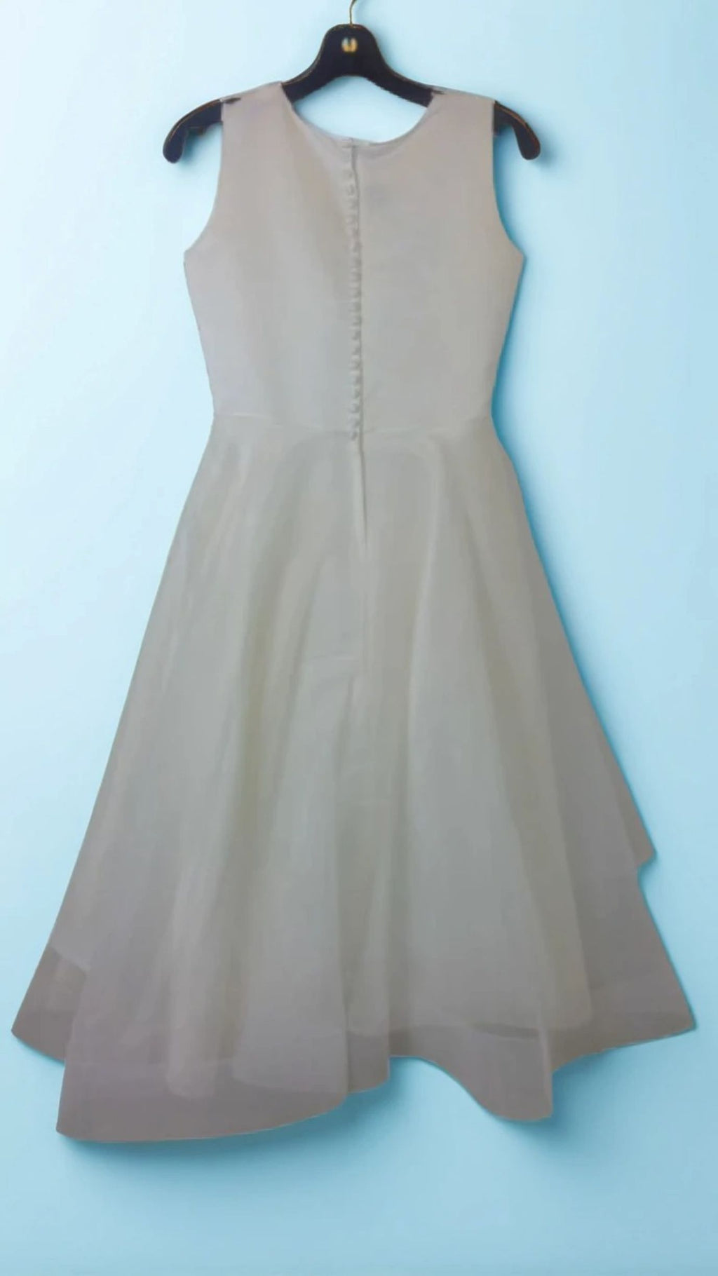 A smart, artistically patterned white dress for girl for any event