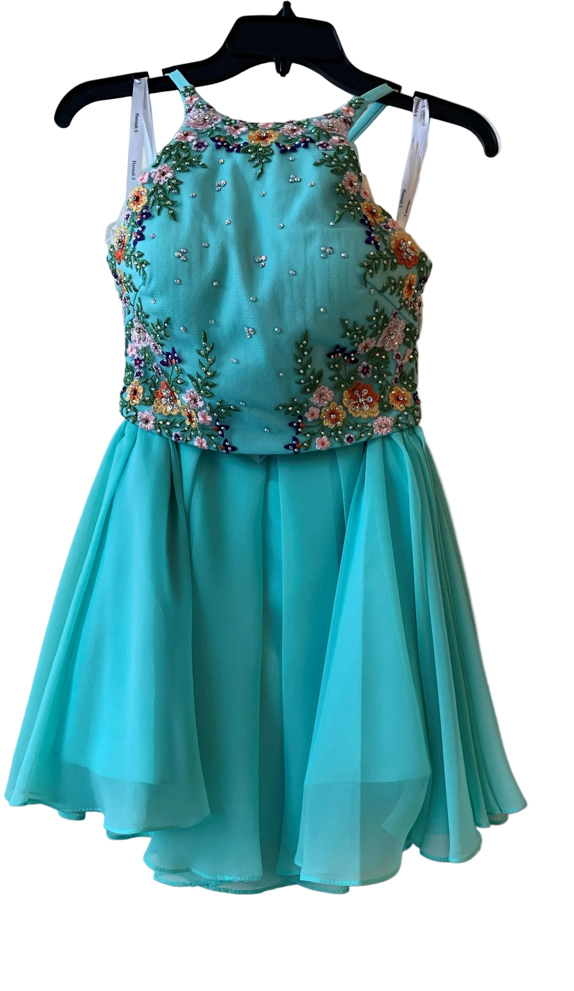 Turquoise dress with floral embellishments