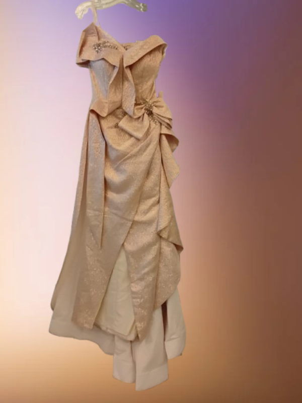 Beige evening gown with large bow