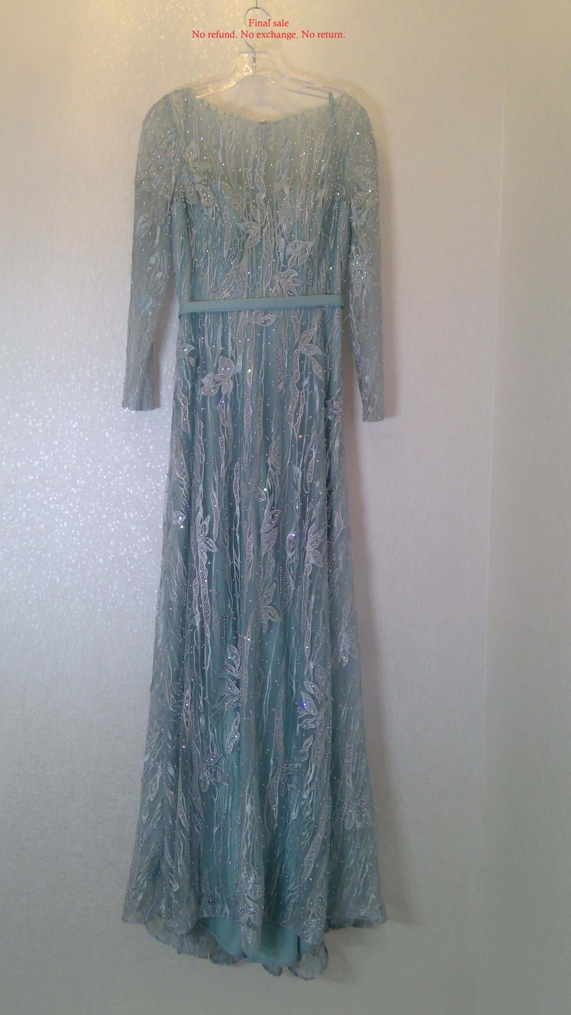 Long-sleeve dress with a textured pattern for evening party.