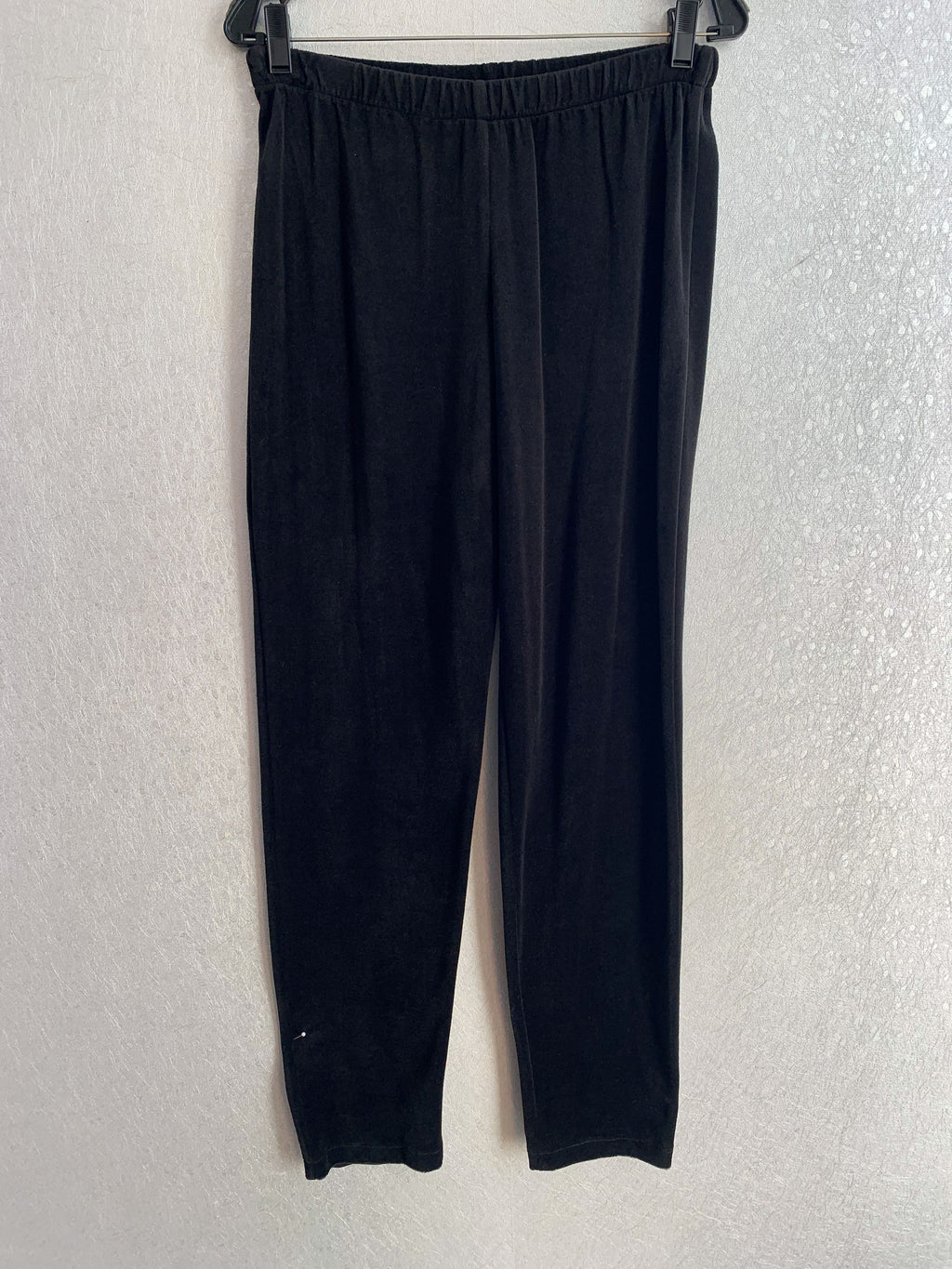 Black and white checkered jacket and black pants