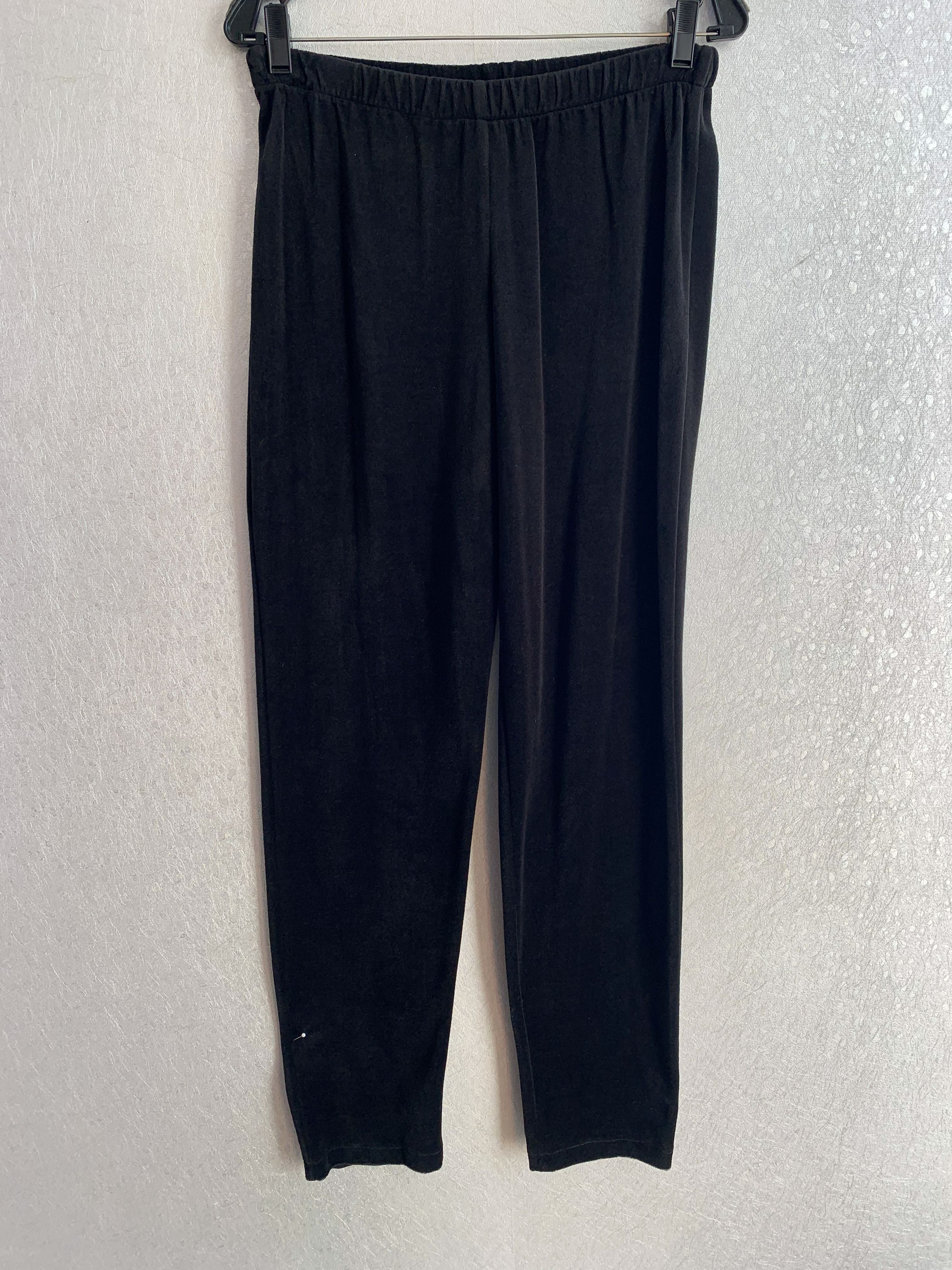 Black and white checkered jacket and black pants