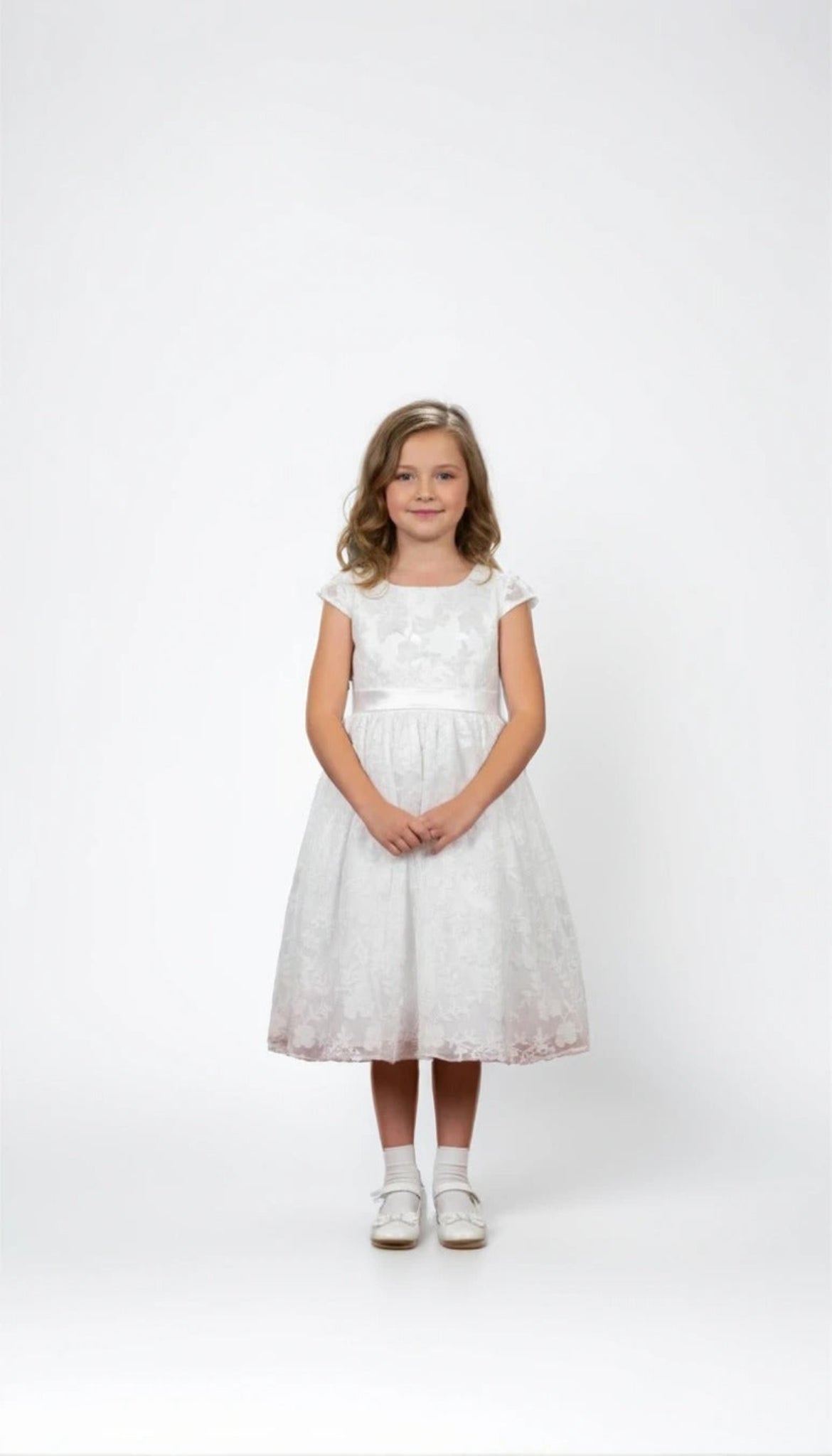 A smart, artistically patterned dress for a girl for any important event